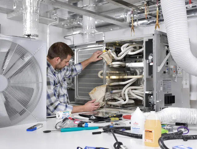 Portsmouth Air Duct Cleaning specialist performing precision AC coil cleaning in Portsmouth