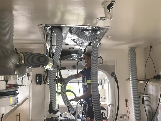 Portsmouth Air Duct Cleaning specialist performing precise mobile home duct cleaning in Portsmouth
