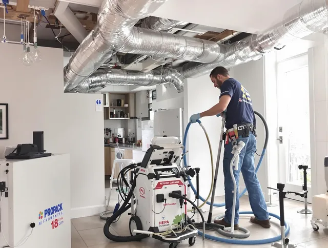 Portsmouth Air Duct Cleaning technician performing advanced pure duct cleaning with specialized equipment in Portsmouth